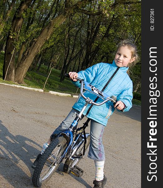 little girl on bicycle. little girl on bicycle