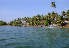 Shore And Coast With Boats And Palms Stock Images Shore And Coast With Boats And Palms Stock Images