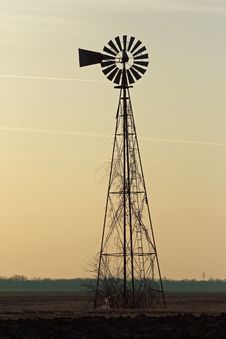 Prairie Windmill At Sunrise Stock Images