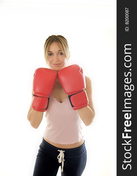 Kickboxer young woman training, isolated. Kickboxer young woman training, isolated