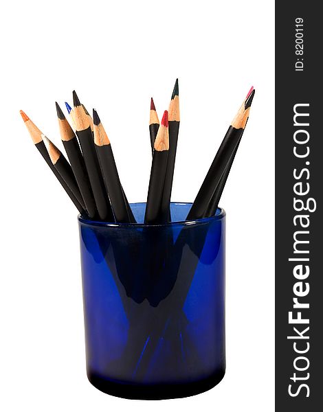 Bunch of color pencils in a blue glass (isolated on white). Bunch of color pencils in a blue glass (isolated on white)