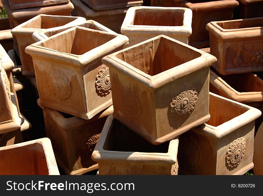 Heap of square clay vases