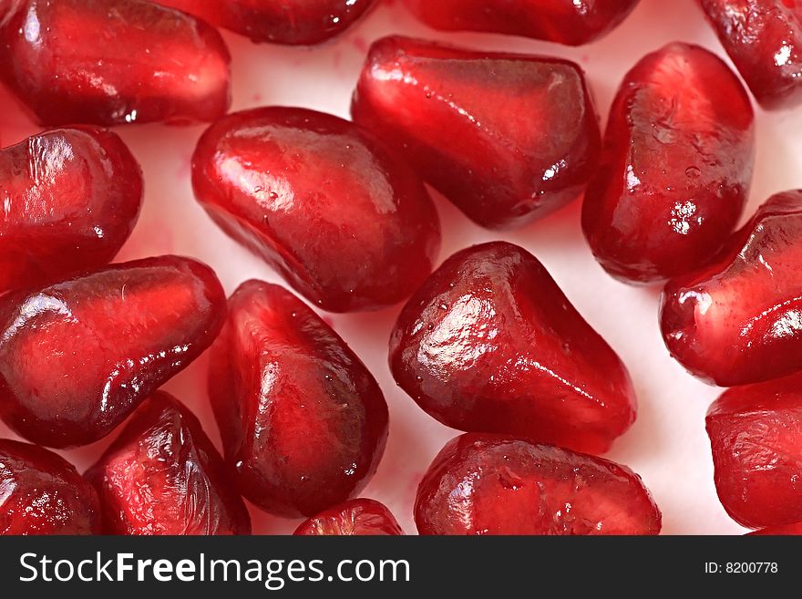 Grains of ripe pomegranate. Fruit.