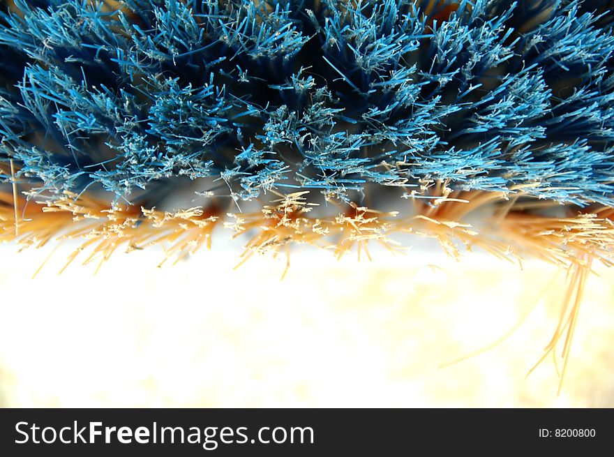 Detail of a blue broom on the ground