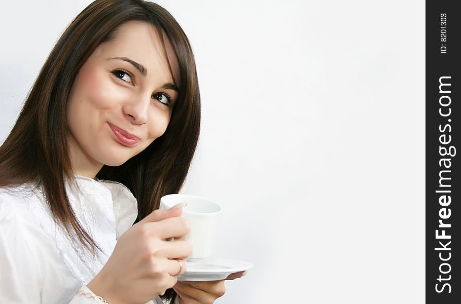 Pretty girl carrying white cup of coffee. Pretty girl carrying white cup of coffee