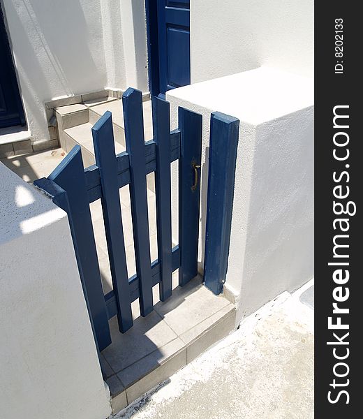 Closed blue gate on Santorini island, Greece