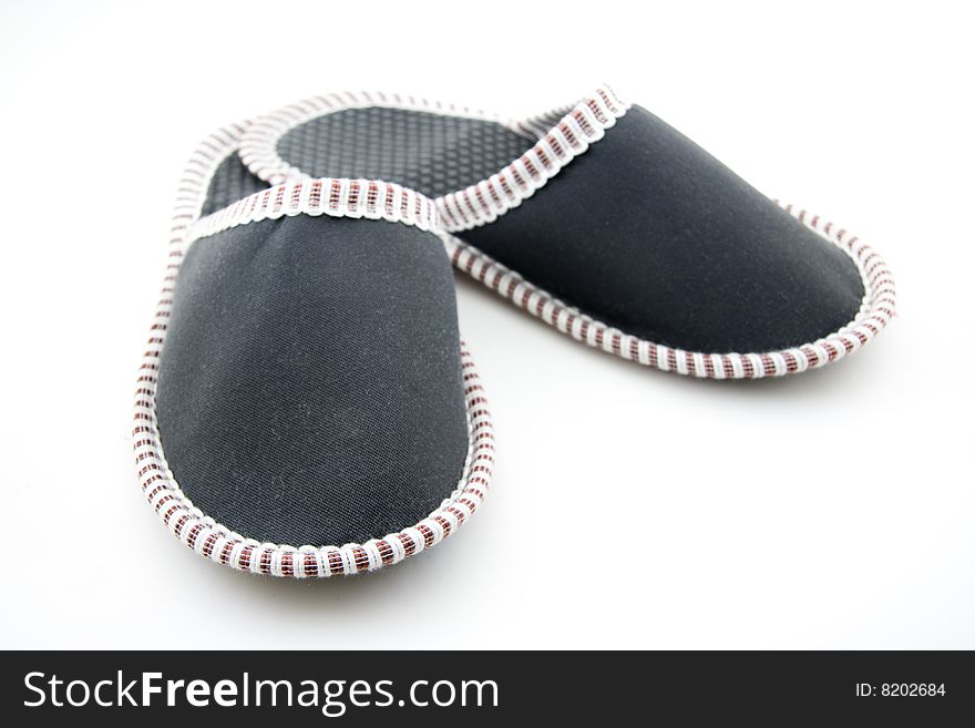 Slippers isolated over white background, concept of leisure.