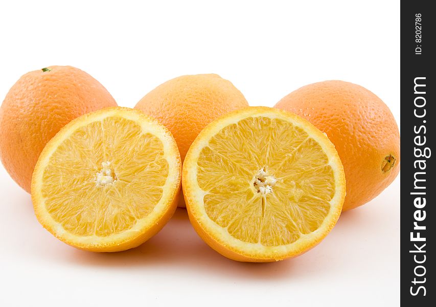 Fresh and refreshing oranges isolated over white background.