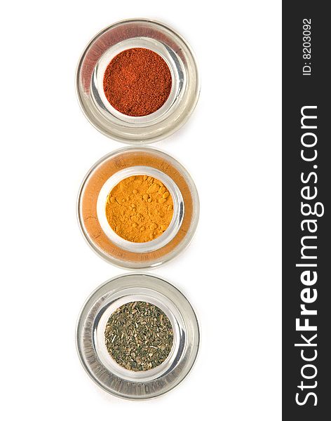 Red yellow and green spices lined up isolated. Red yellow and green spices lined up isolated