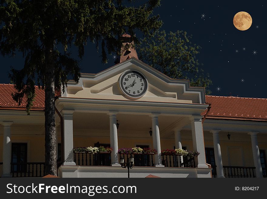 Luxury home with clock at night