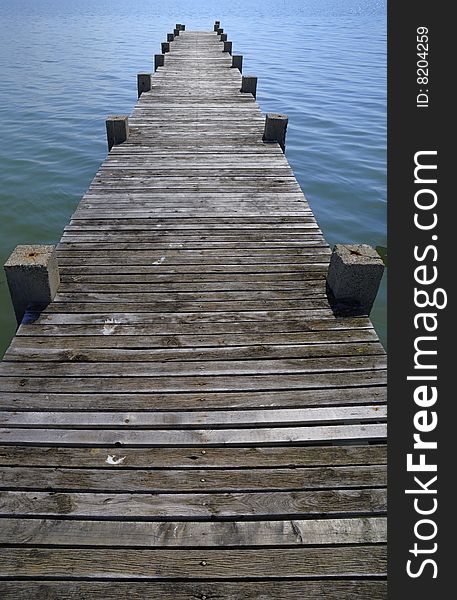 Landscape photo of wooden jetty in south of France