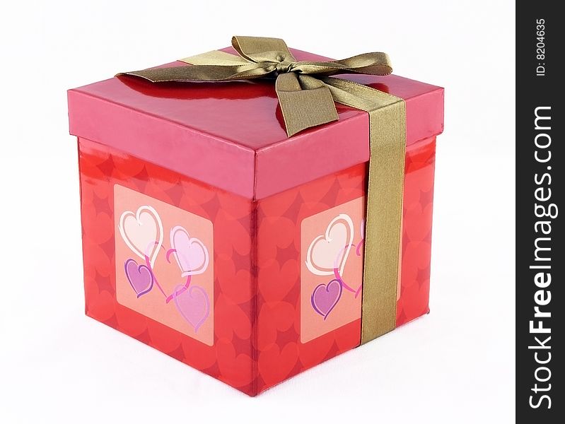 Closeup beautiful red box with hearts on it isoleted on white background. Closeup beautiful red box with hearts on it isoleted on white background