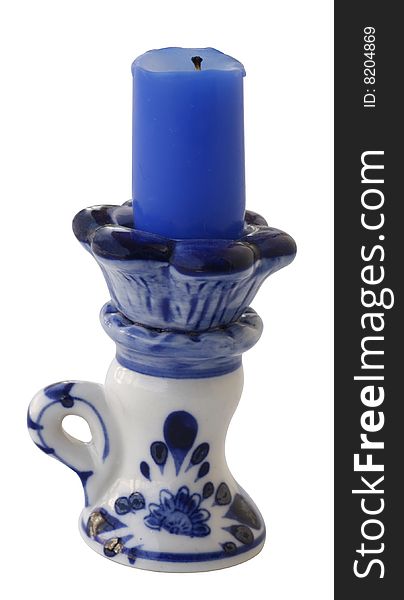 Candlestick with a blue candle