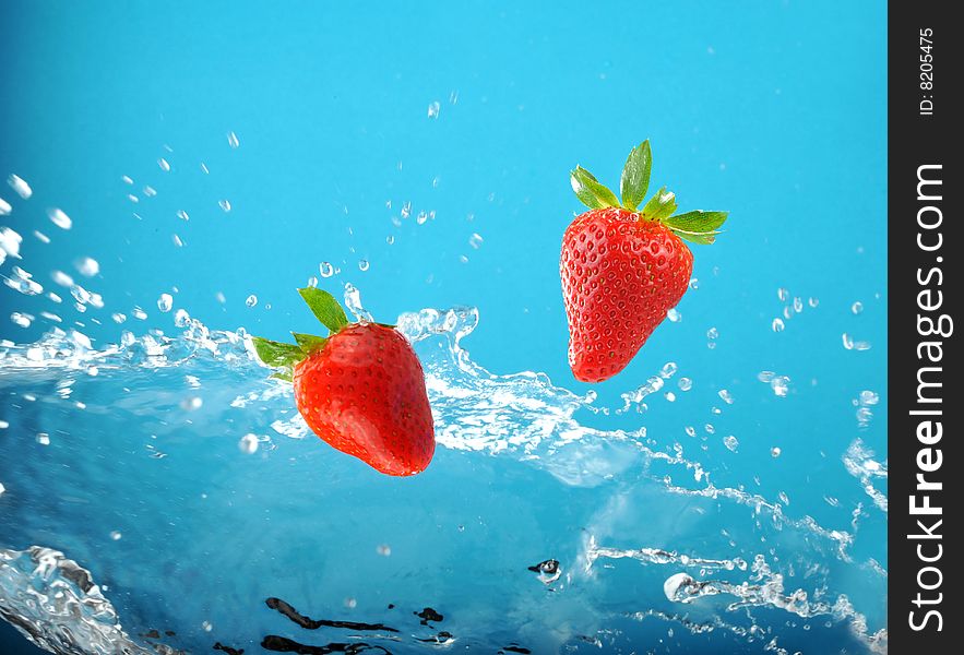 Fresh colored splash with strawberrys