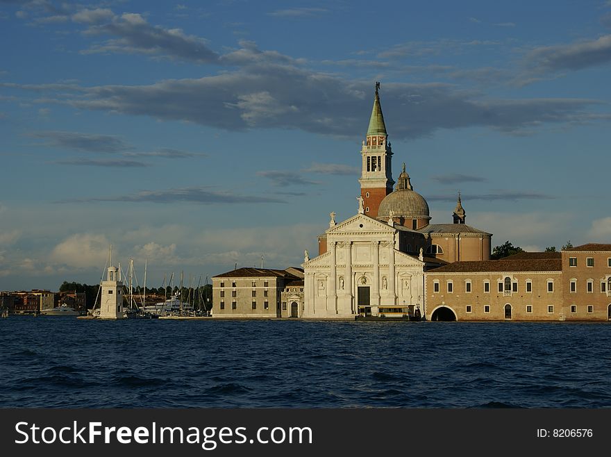 Church in Venice, Italy with dramatic cloud formations. Church in Venice, Italy with dramatic cloud formations.