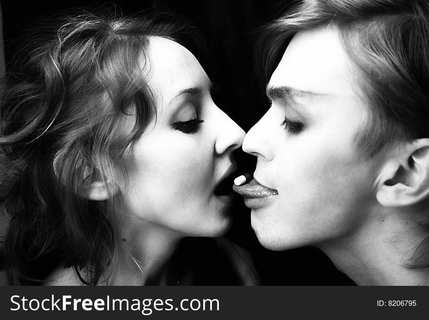 Young man and the woman with a tablet close up. Young man and the woman with a tablet close up