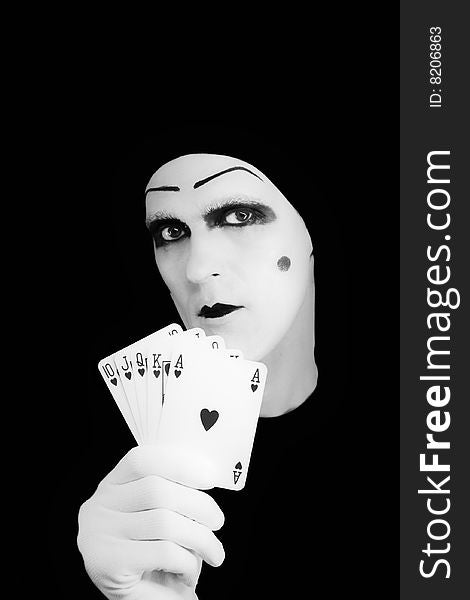 Portrait of the mime with Royal Flush on a black background