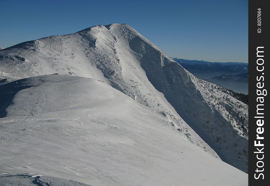 Winter season on snowy mountain. Winter season on snowy mountain