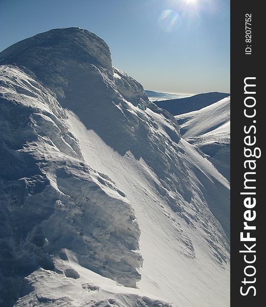 Winter - High peak on snowy mountains