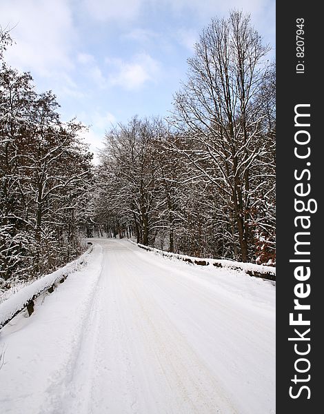 Winter landscape - road covered in snow
