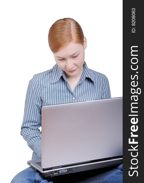 Young business woman with the laptop isolated on a white background