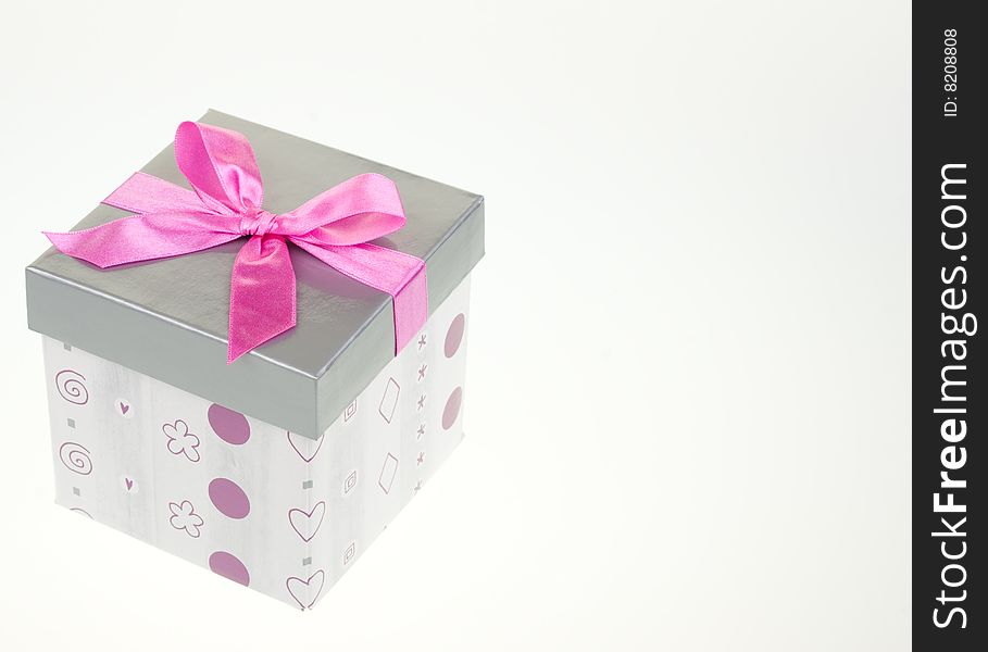 Gray gift box, isolated on white, with bow