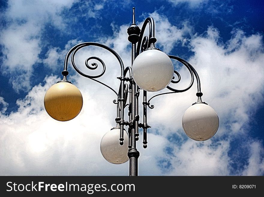 A streetlight under the blue sky