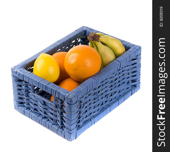 Blue basket with fruits on white background