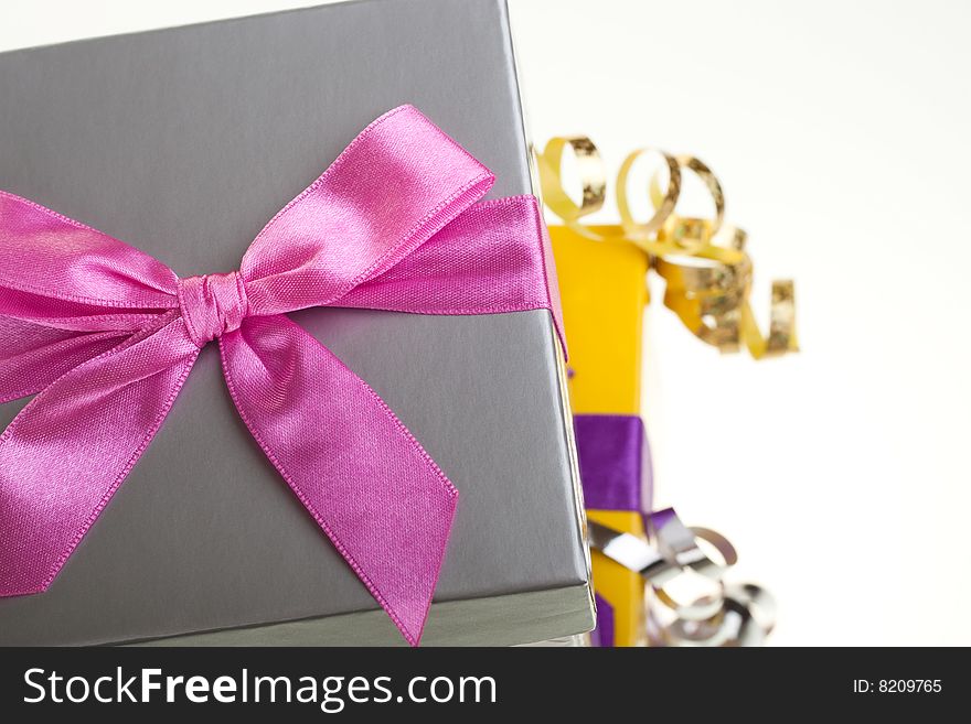 Various gift boxes on a white background, with bow and ribbon. Various gift boxes on a white background, with bow and ribbon