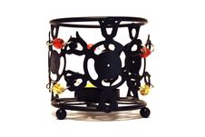 Black Candlestick With Red And Yellow Beads Royalty Free Stock Photography Black Candlestick With Red And Yellow Beads Royalty Free Stock Photography