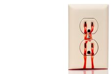A Bleeding Electrical Outlet On White Stock Photography