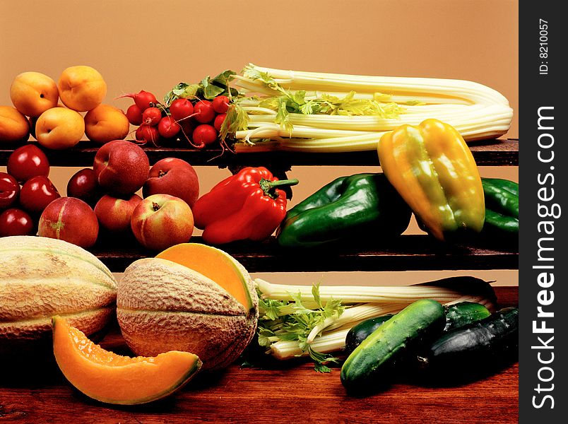 Group of various vegetables on a table made of wood. Group of various vegetables on a table made of wood.