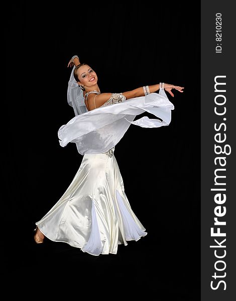 Dancer in classical blue-white dress isolated on black