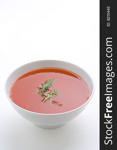 Delicious and healthy homemade tomato soup and vegetables isolated