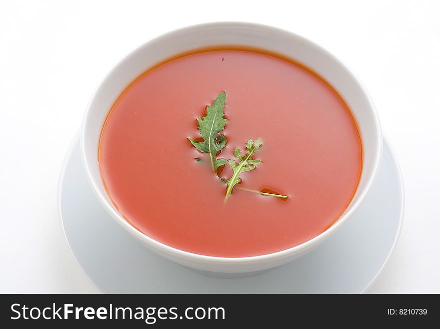 Delicious and healthy homemade tomato soup and vegetables isolated