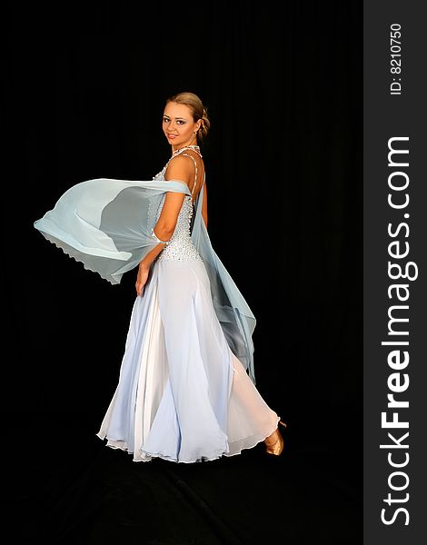 Girl in dance in classical blue-white dress