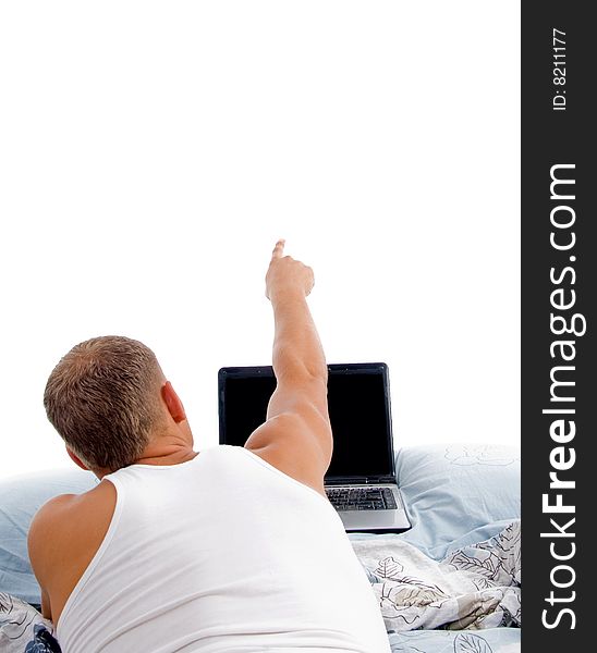 Laying indicating man with laptop on an isolated white background. Laying indicating man with laptop on an isolated white background