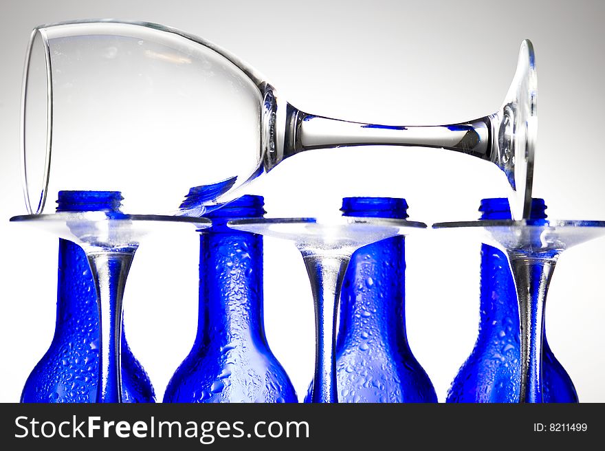 Background with creative bottles.GLASS