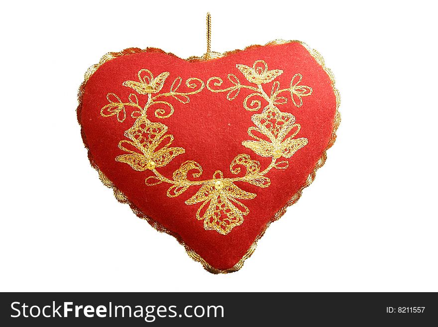 Red pillow as a heart. Handmade. May be used as valentine day simbol