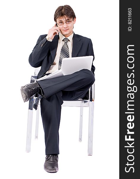 Young Businessman Looks Laptop