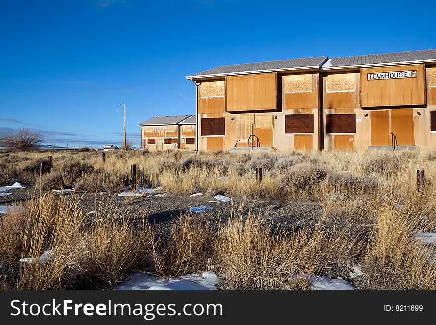 Abandoned town in Wyoming. Jeffrey City, Wyoming - a Uranium-mining boomtown established around 1957, it went bust when the mine shut down in 1982 and 95% of its population fled the city.