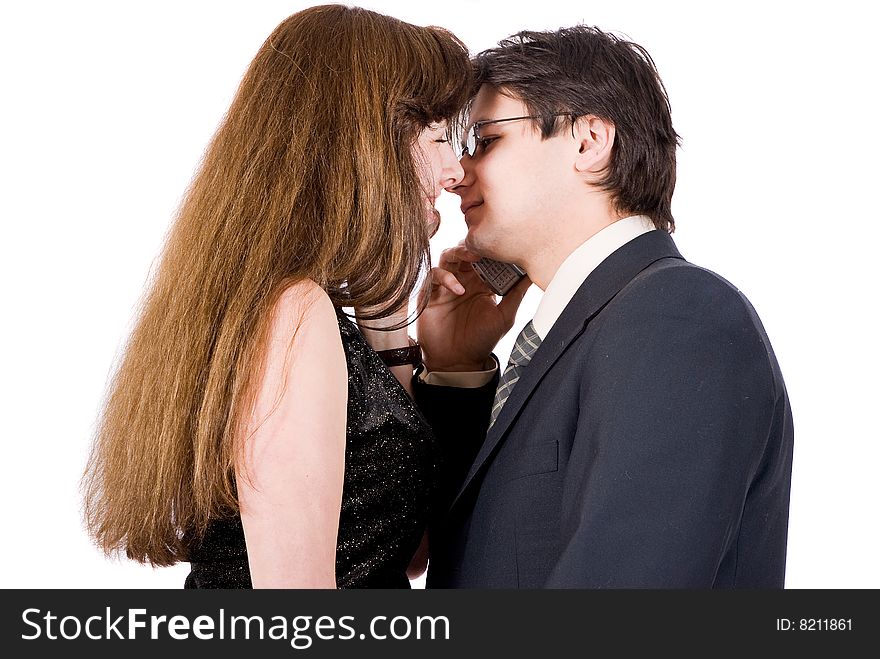 Young couple talking on the phone isolated on white