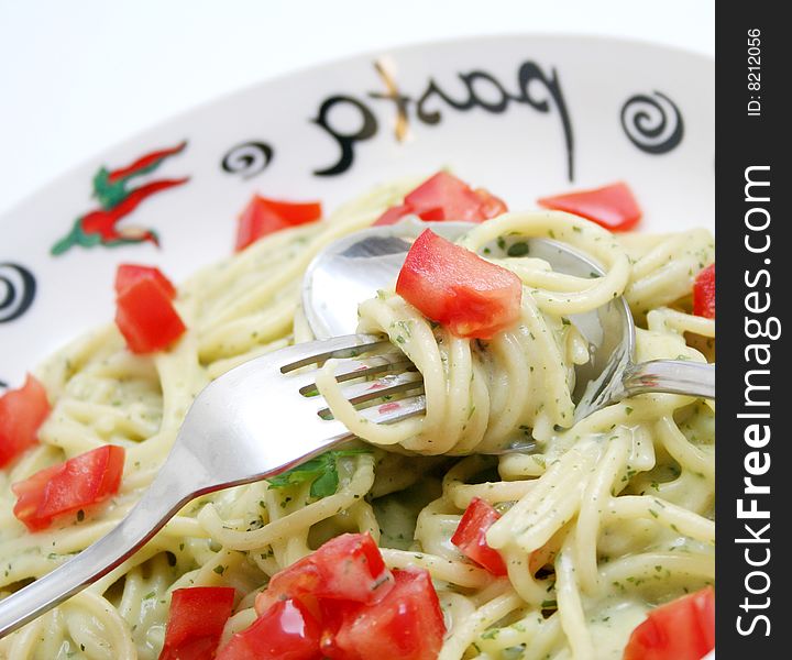 Fresh italian pasta with cheese-sauce and tomatoes. Fresh italian pasta with cheese-sauce and tomatoes