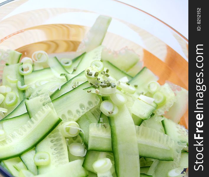 Fresh salad of cucumbers with spring onions