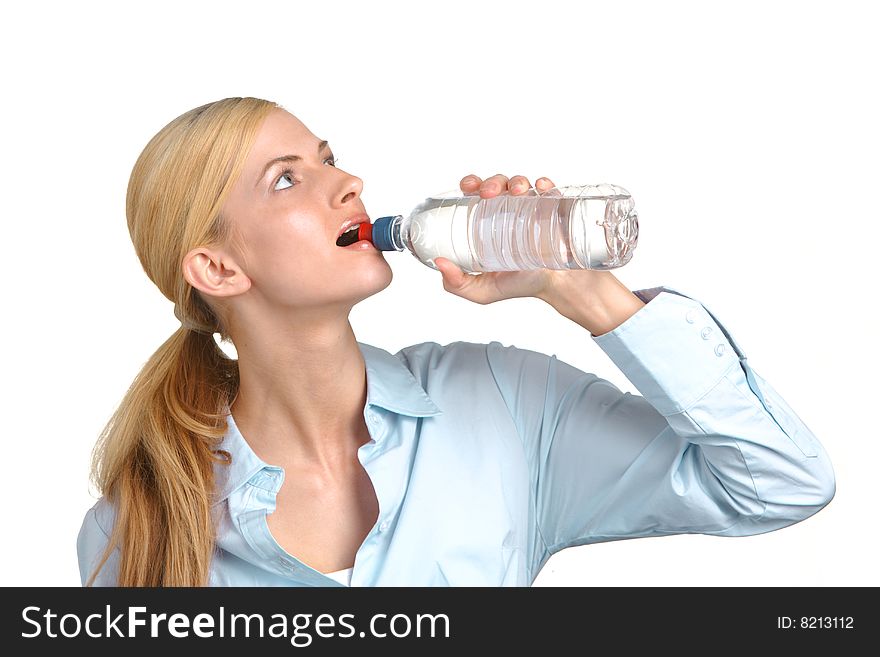 Business woman drinking water from a bottle