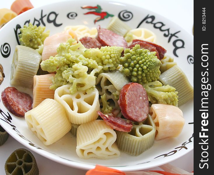 Fresh italian pasta with sausage and cabbage. Fresh italian pasta with sausage and cabbage