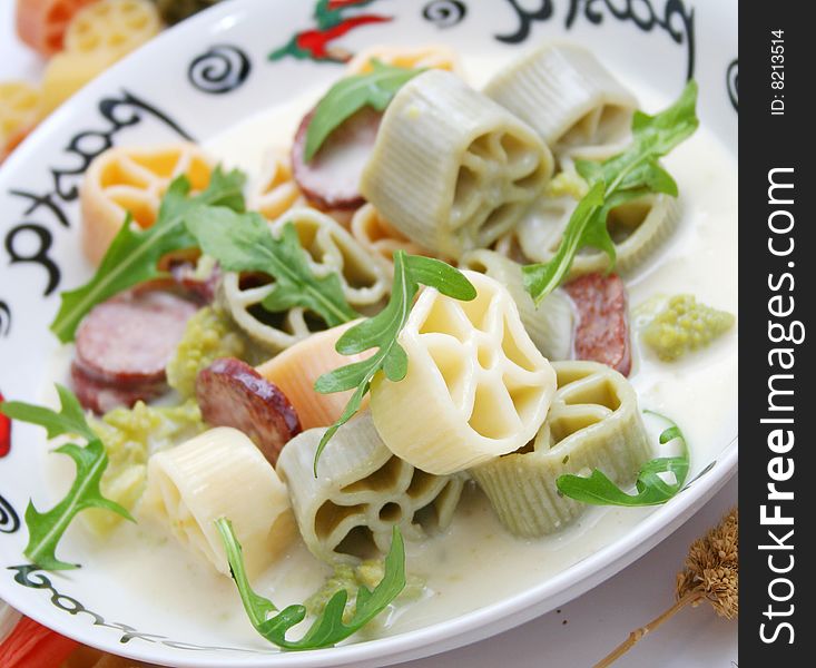 Fresh italian pasta with sausage and cabbage. Fresh italian pasta with sausage and cabbage