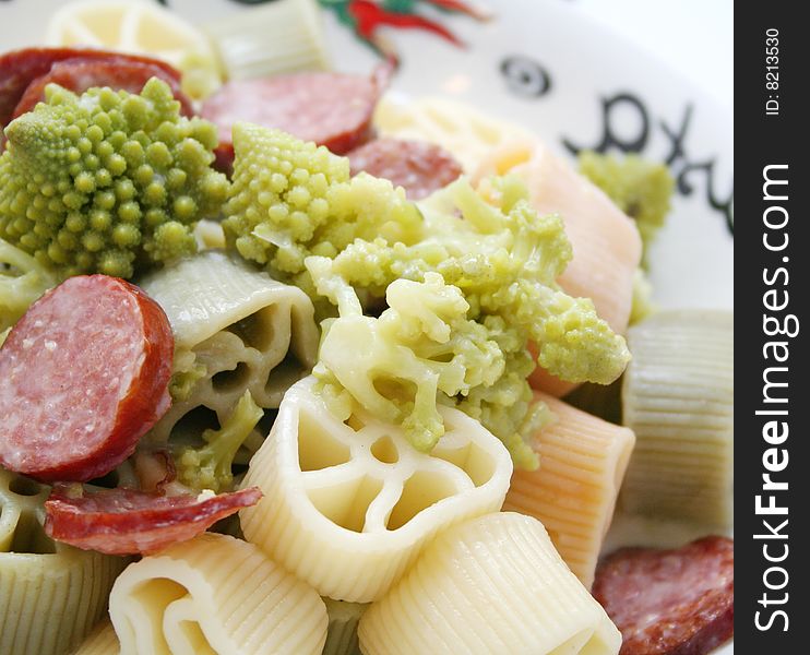 Fresh italian pasta with sausage and cabbage. Fresh italian pasta with sausage and cabbage