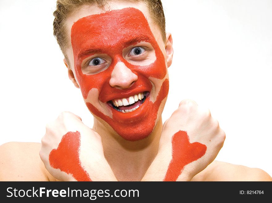 Smiling man with painted face and arms