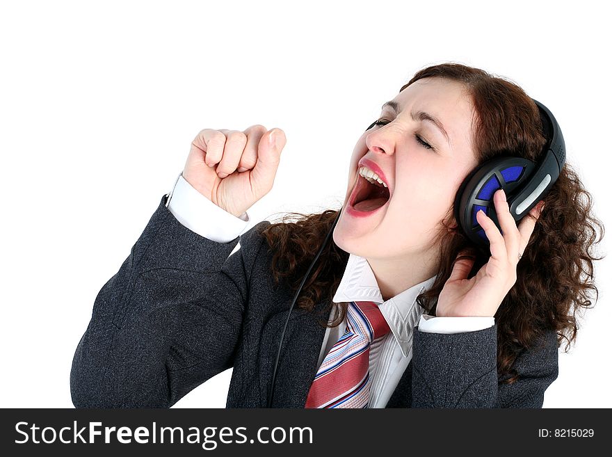 Singing and listening - girl in headphones isolated on white. Singing and listening - girl in headphones isolated on white
